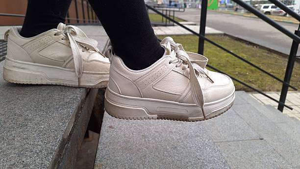 Close view of comfortable walking shoes on a sidewalk